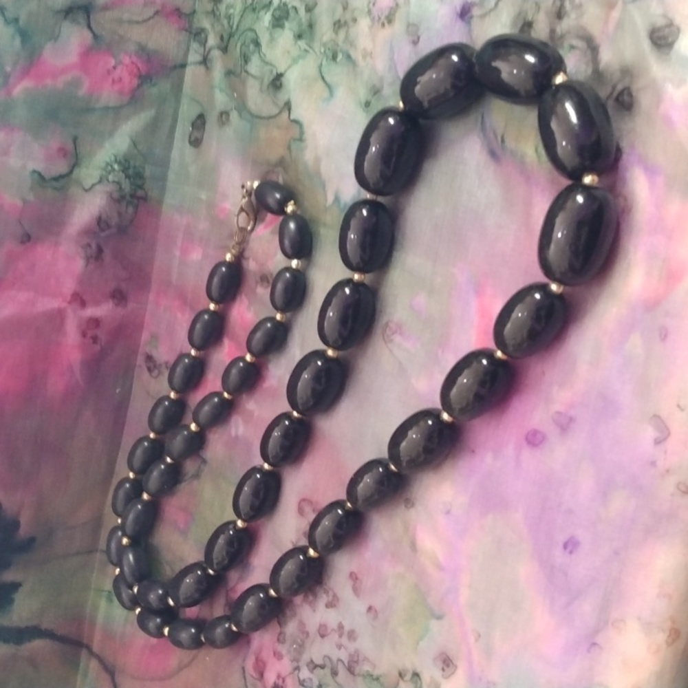Vintage black necklace with gold accents
